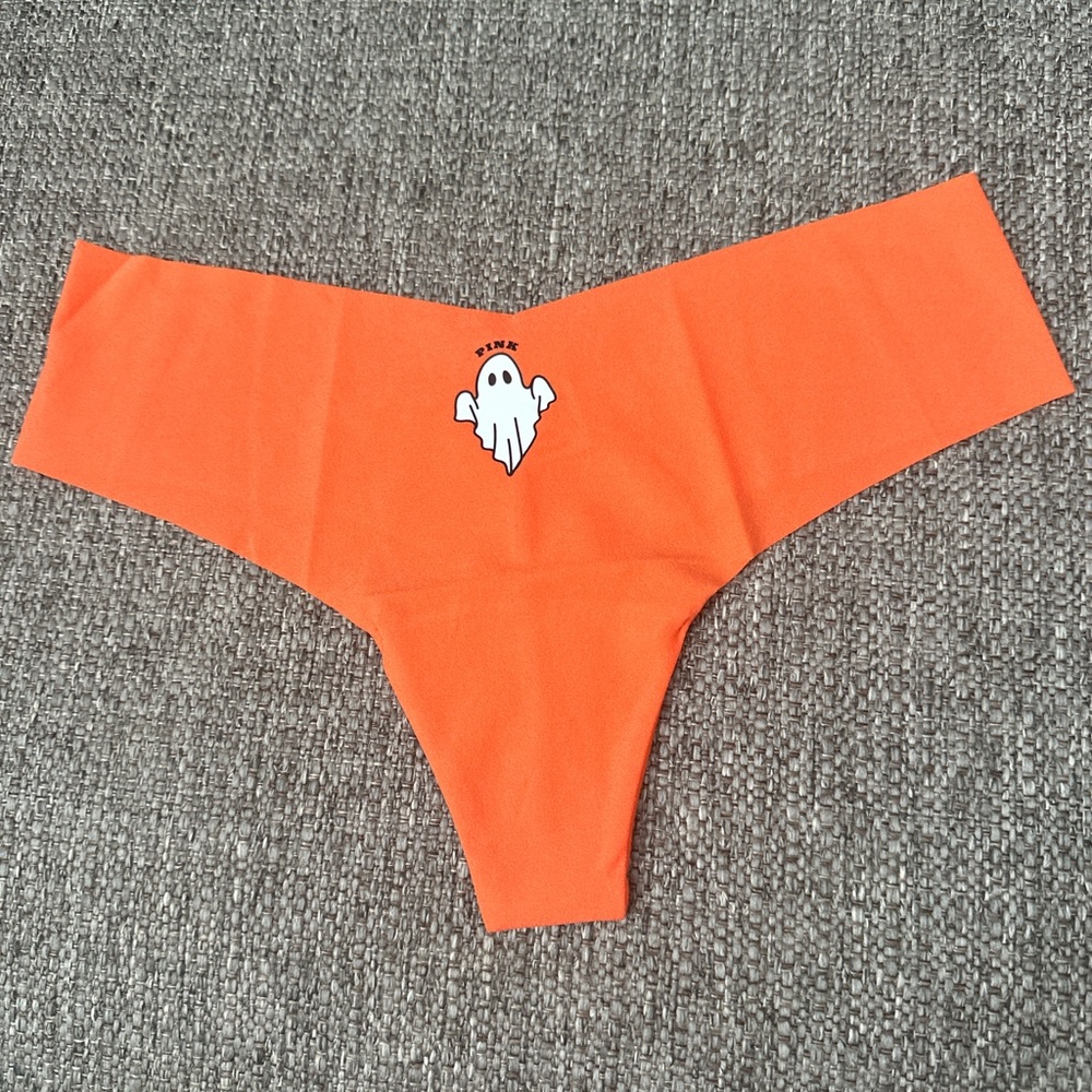 PINK Victoria’s Secret Orange Seamless Thong with Ghost Graphic